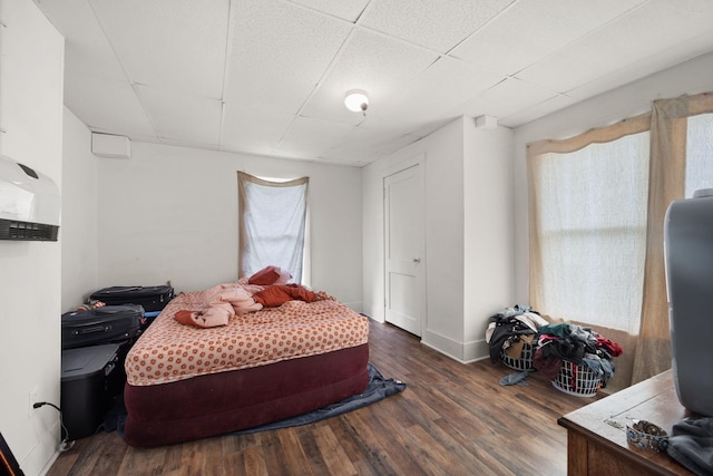106 18th St, Corbin, KY 40701 - bedroom featuring a paneled ceiling and hardwood / wood-style floors