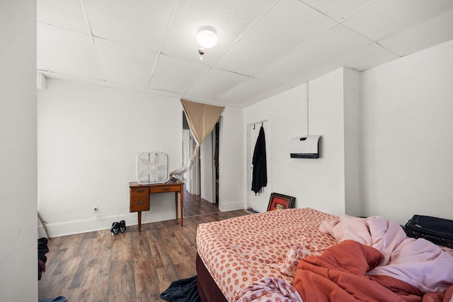 106 18th St, Corbin, KY 40701 - bedroom featuring a drop ceiling and hardwood / wood-style floors