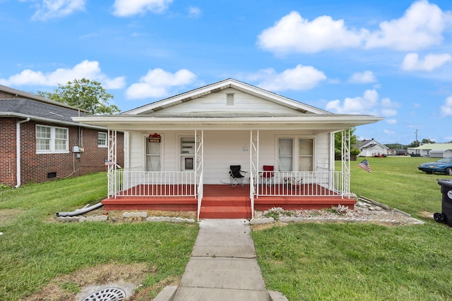 106 18th St, Corbin, KY 40701 - view of front of house featuring covered porch and a front yard