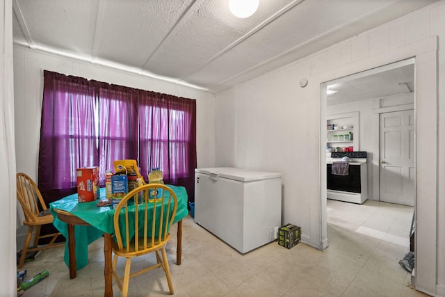 106 18th St, Corbin, KY 40701 - tiled dining area with a textured ceiling
