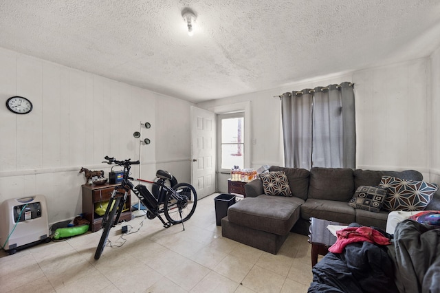 106 18th St, Corbin, KY 40701 - tiled living room featuring a textured ceiling