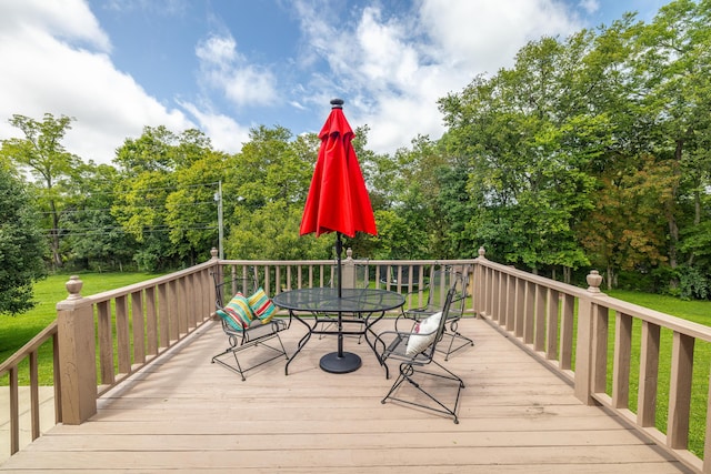 deck with outdoor dining area