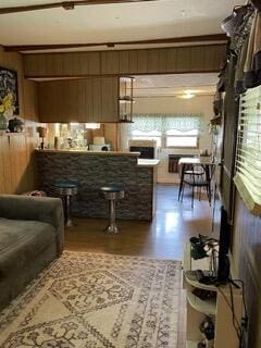 living area with wood finished floors