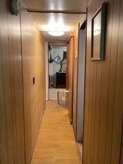 hallway featuring light hardwood / wood-style flooring