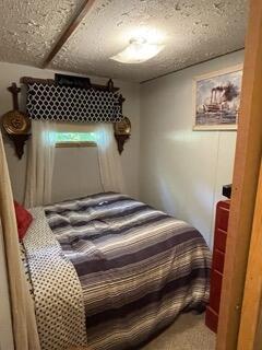 bedroom with a textured ceiling