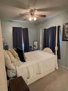 bedroom featuring carpet floors and ceiling fan