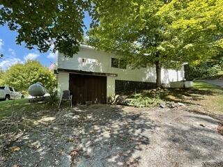 view of home's exterior with a garage