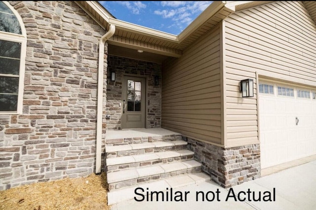 entrance to property with a garage