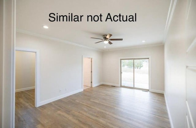 empty room featuring crown molding, hardwood / wood-style floors, and ceiling fan