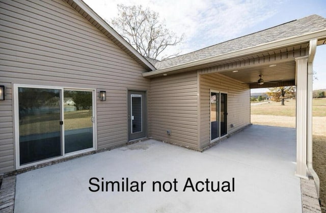 view of patio / terrace featuring ceiling fan