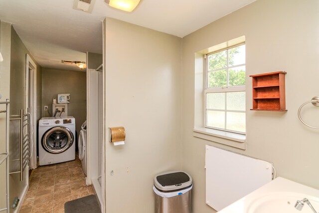 bathroom with tile patterned floors