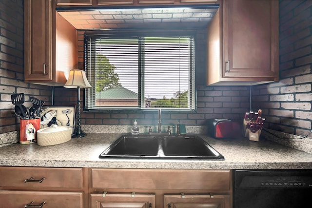 kitchen with sink and black dishwasher