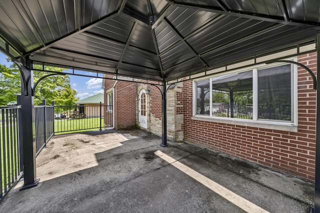 view of car parking featuring a lawn