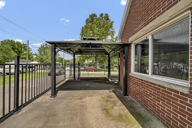 view of vehicle parking featuring a gazebo