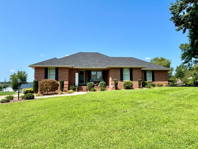 view of front facade with a front lawn