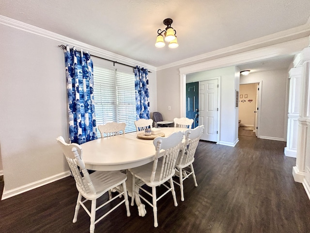 dining space with ornamental molding, dark hardwood / wood-style floors, and a chandelier