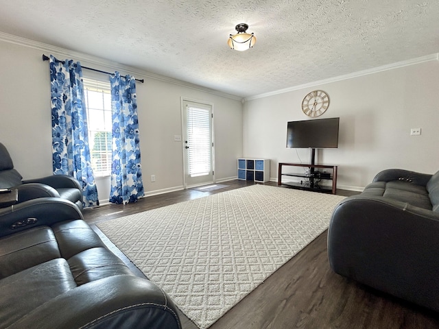 living room featuring crown molding, dark wood-type flooring, and a healthy amount of sunlight