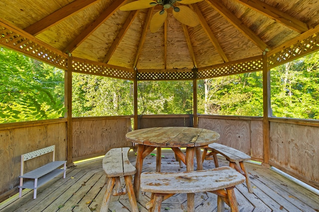 wooden deck featuring ceiling fan and a gazebo