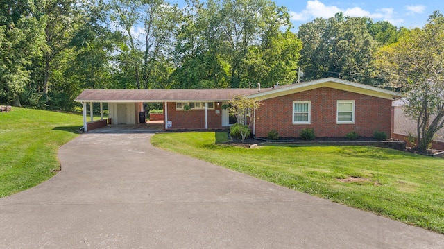 ranch-style house featuring a carport and a front yard