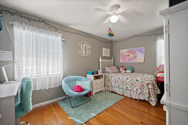 bedroom featuring ceiling fan and wood-type flooring