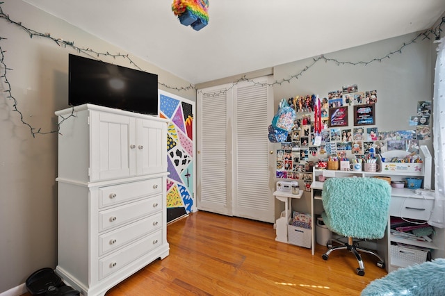 office space with light wood-type flooring