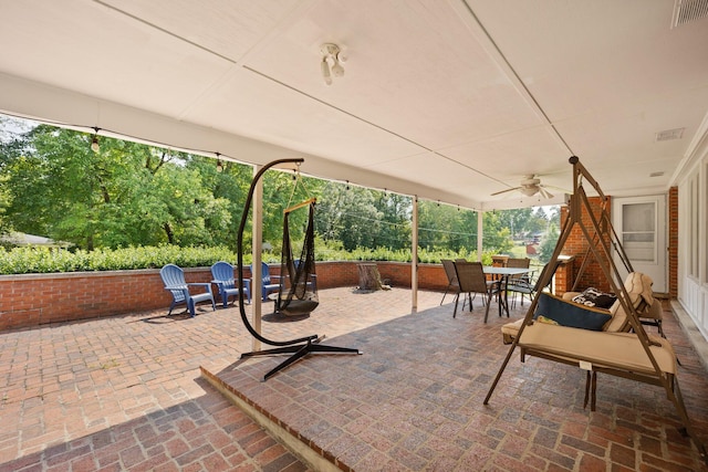 view of patio with ceiling fan