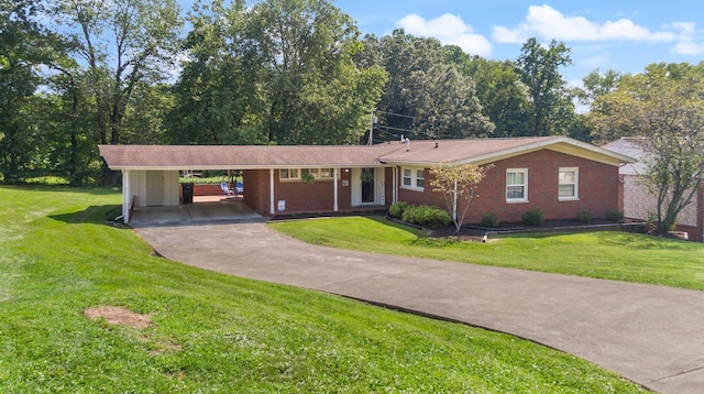 single story home featuring a carport and a front yard