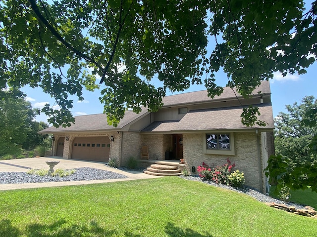 single story home featuring a garage and a front yard