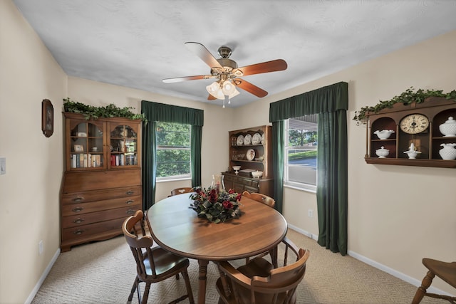 175 N Bend Rd, Stanton, KY 40380 - dining room with light carpet, baseboards, and ceiling fan