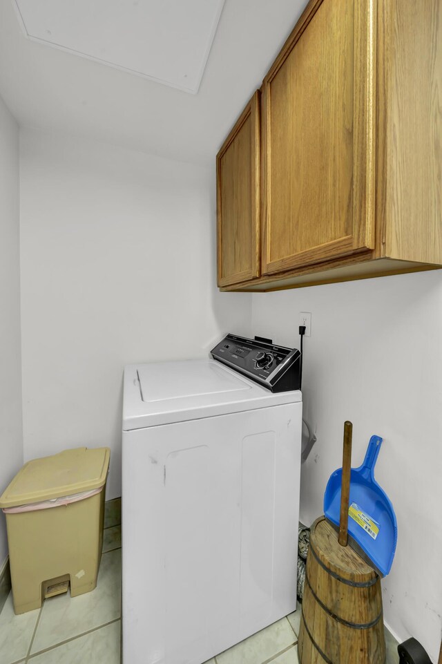 175 N Bend Rd, Stanton, KY 40380 - laundry room featuring washer / dryer, cabinet space, and light tile patterned floors