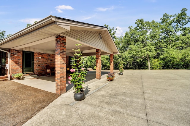 175 N Bend Rd, Stanton, KY 40380 - view of patio featuring driveway and a carport