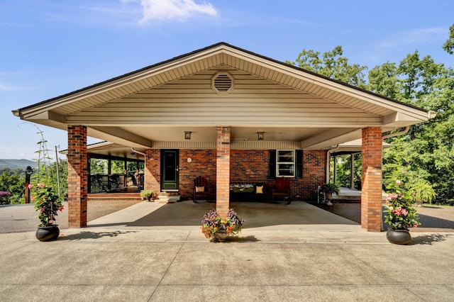 175 N Bend Rd, Stanton, KY 40380 - view of patio with concrete driveway and a carport
