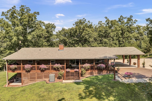 175 N Bend Rd, Stanton, KY 40380 - back of house featuring a deck, a chimney, and a yard