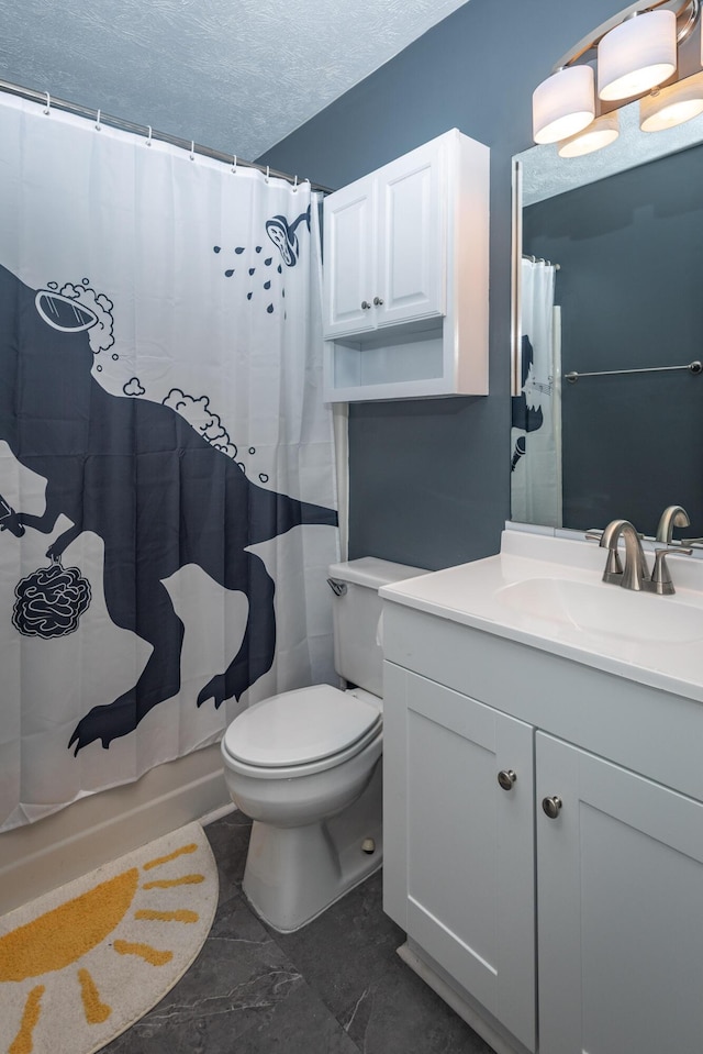 bathroom with vanity, toilet, a textured ceiling, and a shower with shower curtain