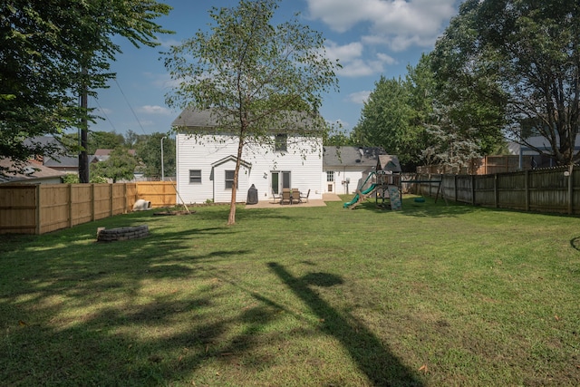 view of yard with a playground