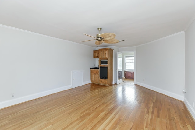 unfurnished living room with crown molding, light hardwood / wood-style floors, and ceiling fan