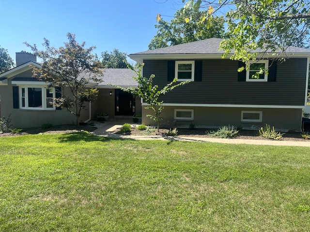 view of front of home with a front lawn