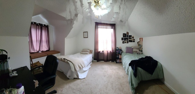 bedroom with a textured ceiling, light carpet, and vaulted ceiling