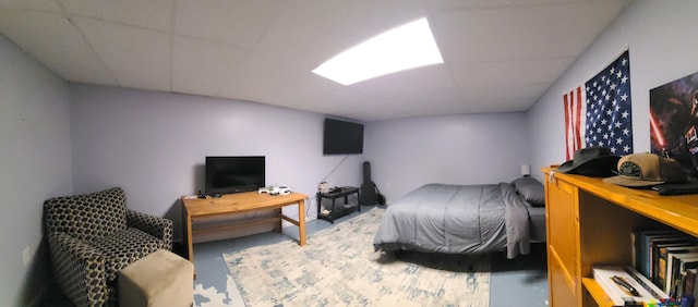 bedroom with a paneled ceiling