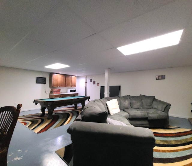 interior space with a drop ceiling and pool table