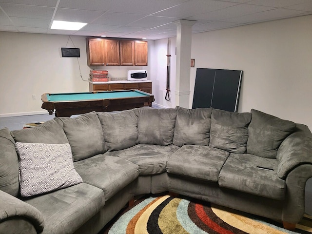 living room featuring a paneled ceiling and billiards