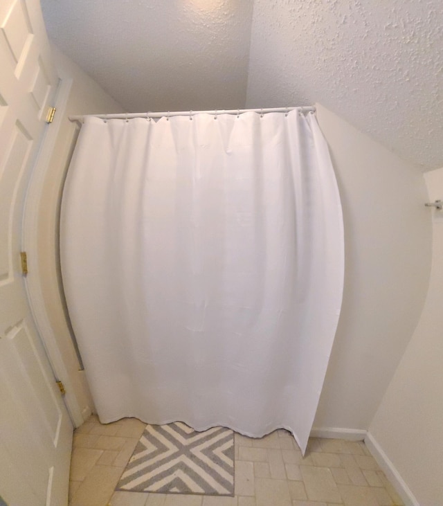 bathroom with tile patterned flooring