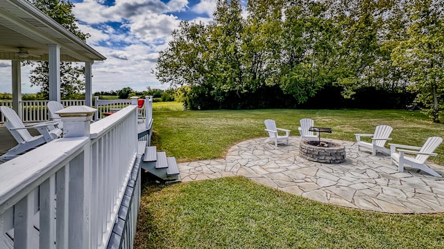 view of yard with a patio and a fire pit