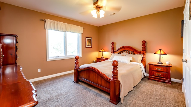 bedroom with ceiling fan and carpet floors