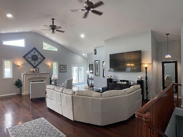 living room featuring a fireplace, ceiling fan, wood finished floors, high vaulted ceiling, and baseboards