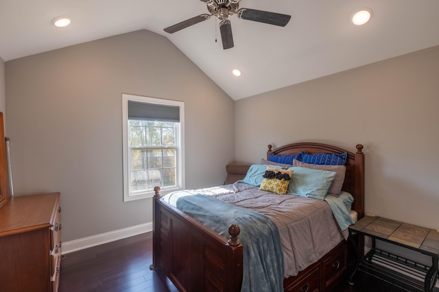 bedroom with lofted ceiling, dark wood-type flooring, and ceiling fan