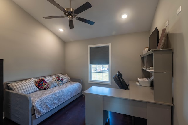 bedroom with dark hardwood / wood-style floors and ceiling fan