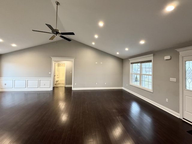 unfurnished living room featuring vaulted ceiling, ceiling fan, and dark hardwood / wood-style flooring