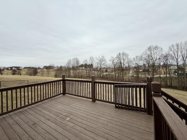 deck featuring a lawn