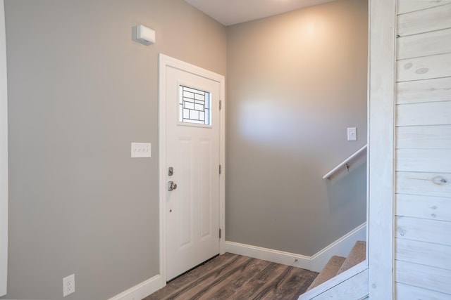 foyer entrance with dark hardwood / wood-style flooring